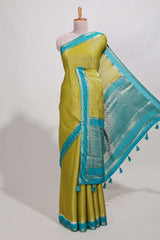 Green art mysore silk saree with retta petta contrast border and rich pallu with plain blouse