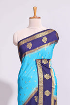Blue zari motifs art mysore silk saree with contrast zari border and blouse