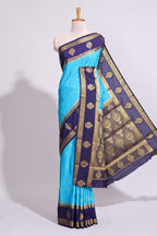Blue zari motifs art mysore silk saree with contrast zari border and blouse