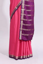 Pink plain art mysore silk saree with contrast zari border and contrast blouse