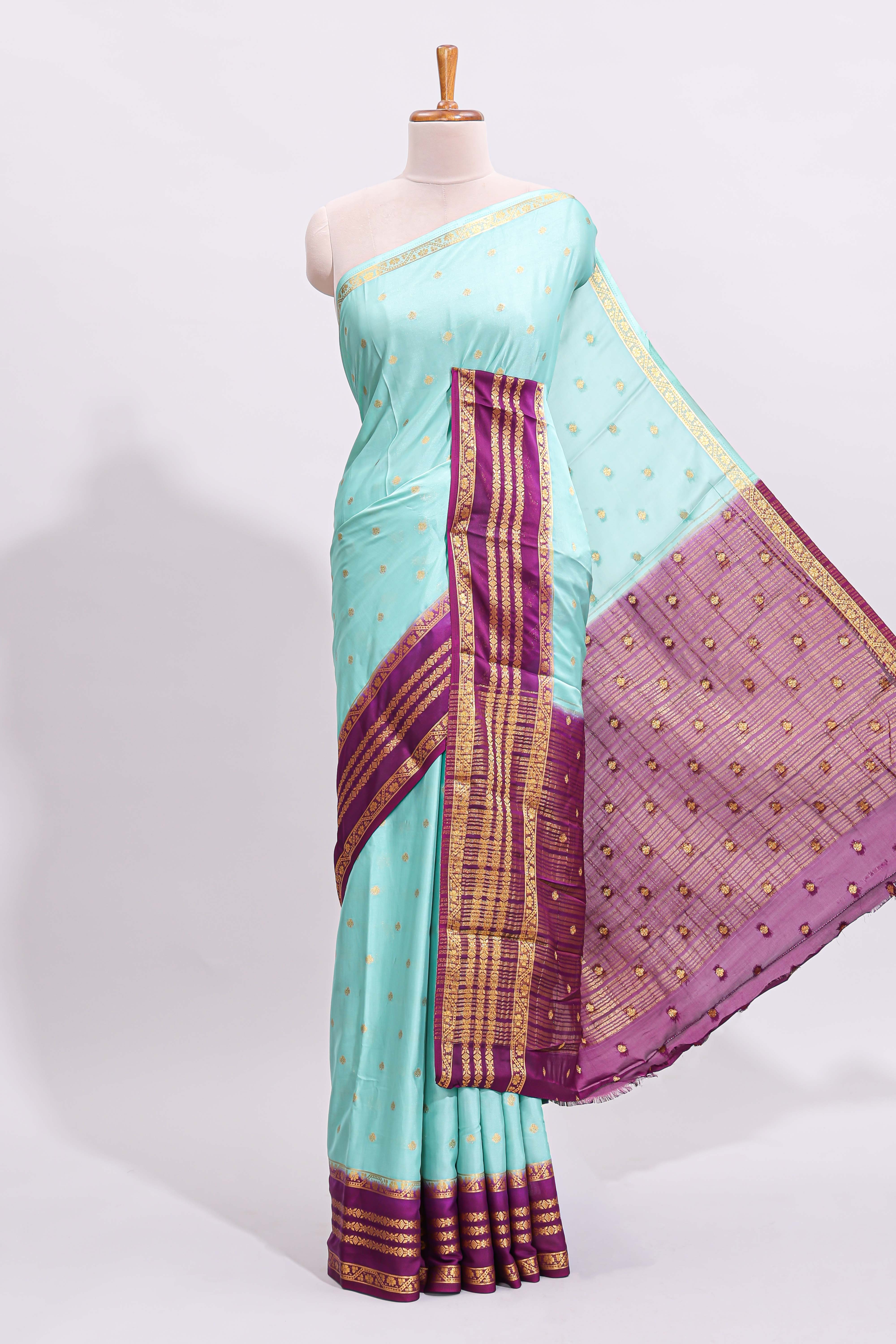 Blue zari butta art mysore silk saree with contrast zari border and motifs blouse