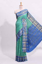 Green zari checked art mysore silk saree with contrast zari border and motifs blouse