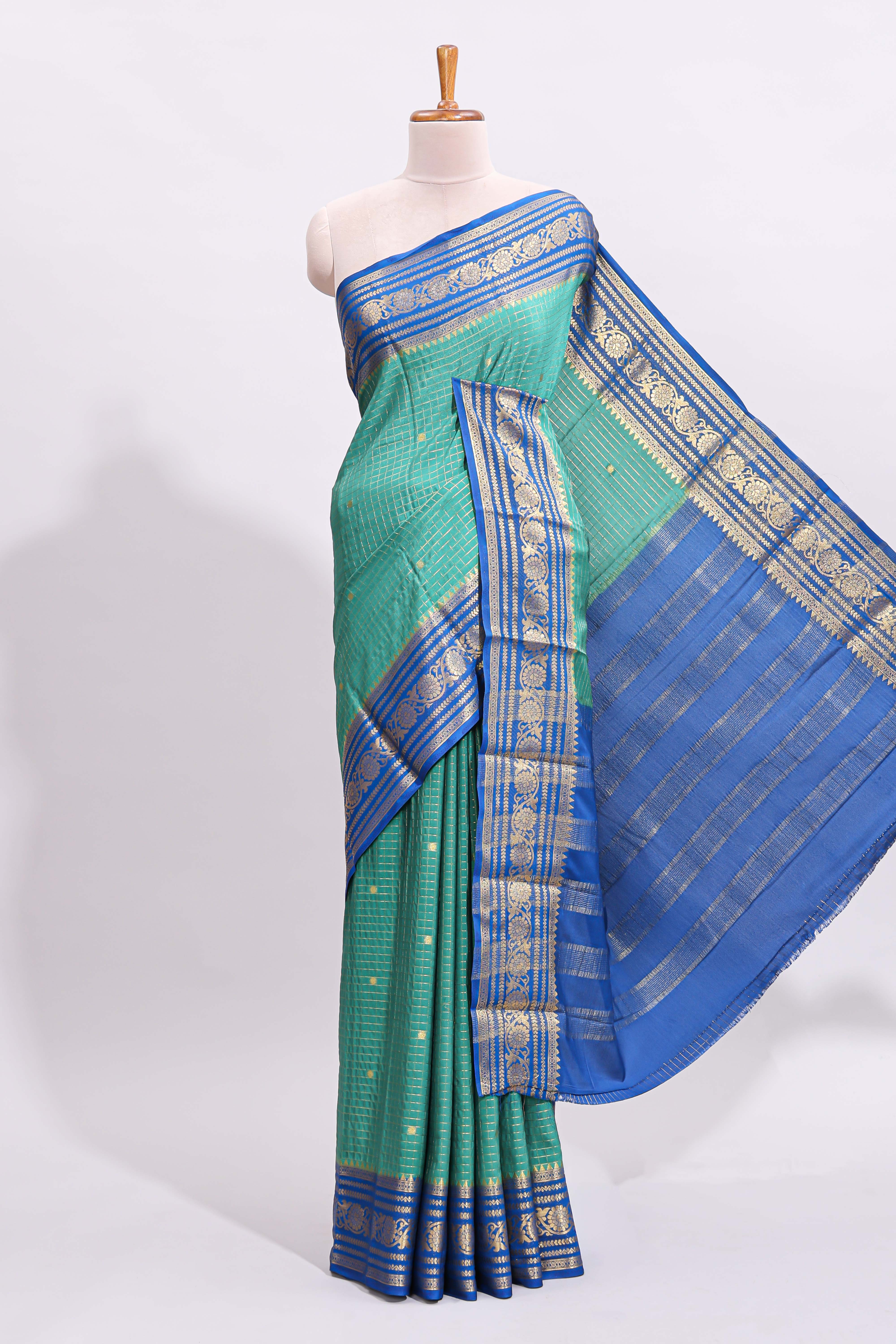 Green zari checked art mysore silk saree with contrast zari border and motifs blouse