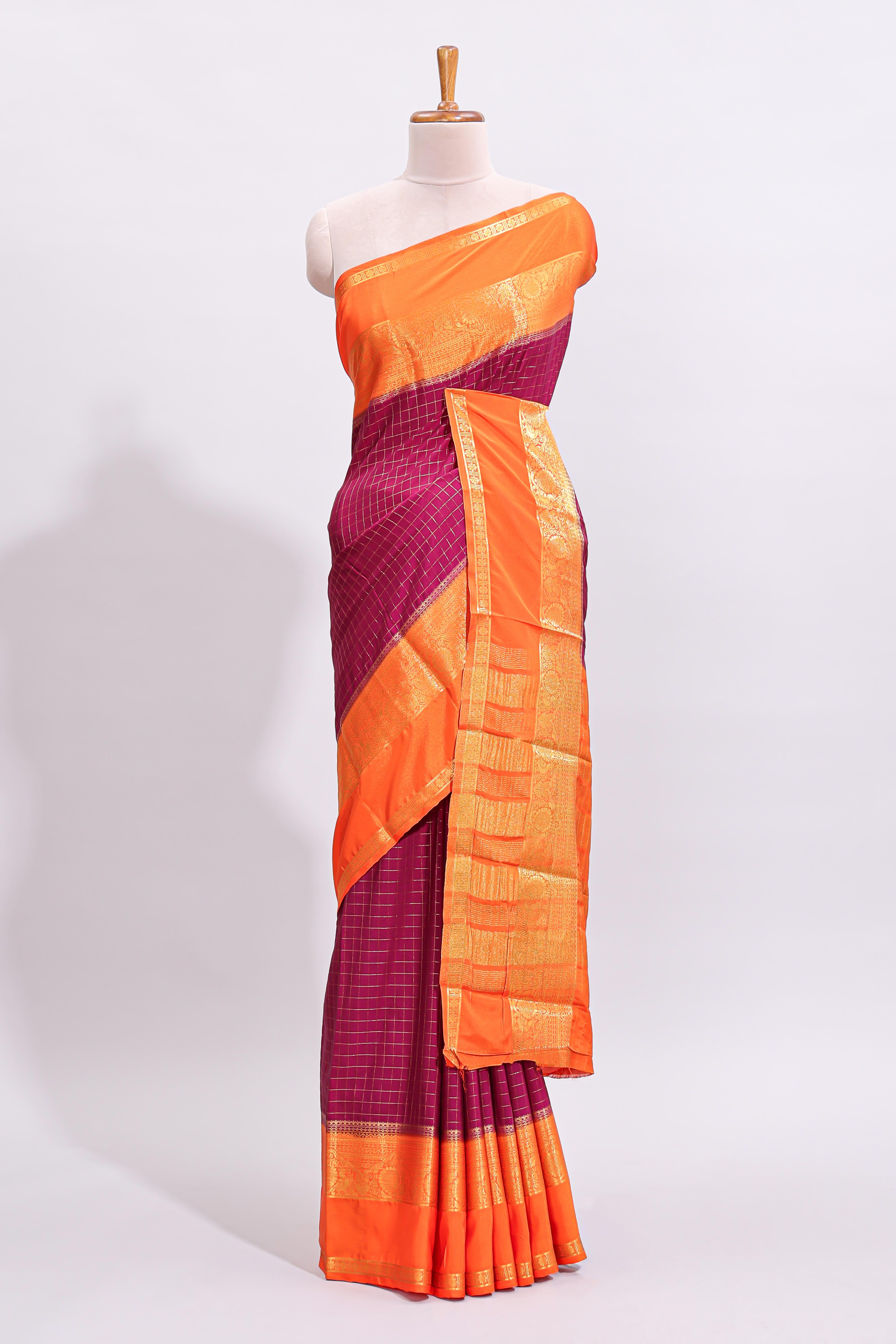 Magenta zari checked art mysore silk saree with contrast zari border and checked blouse