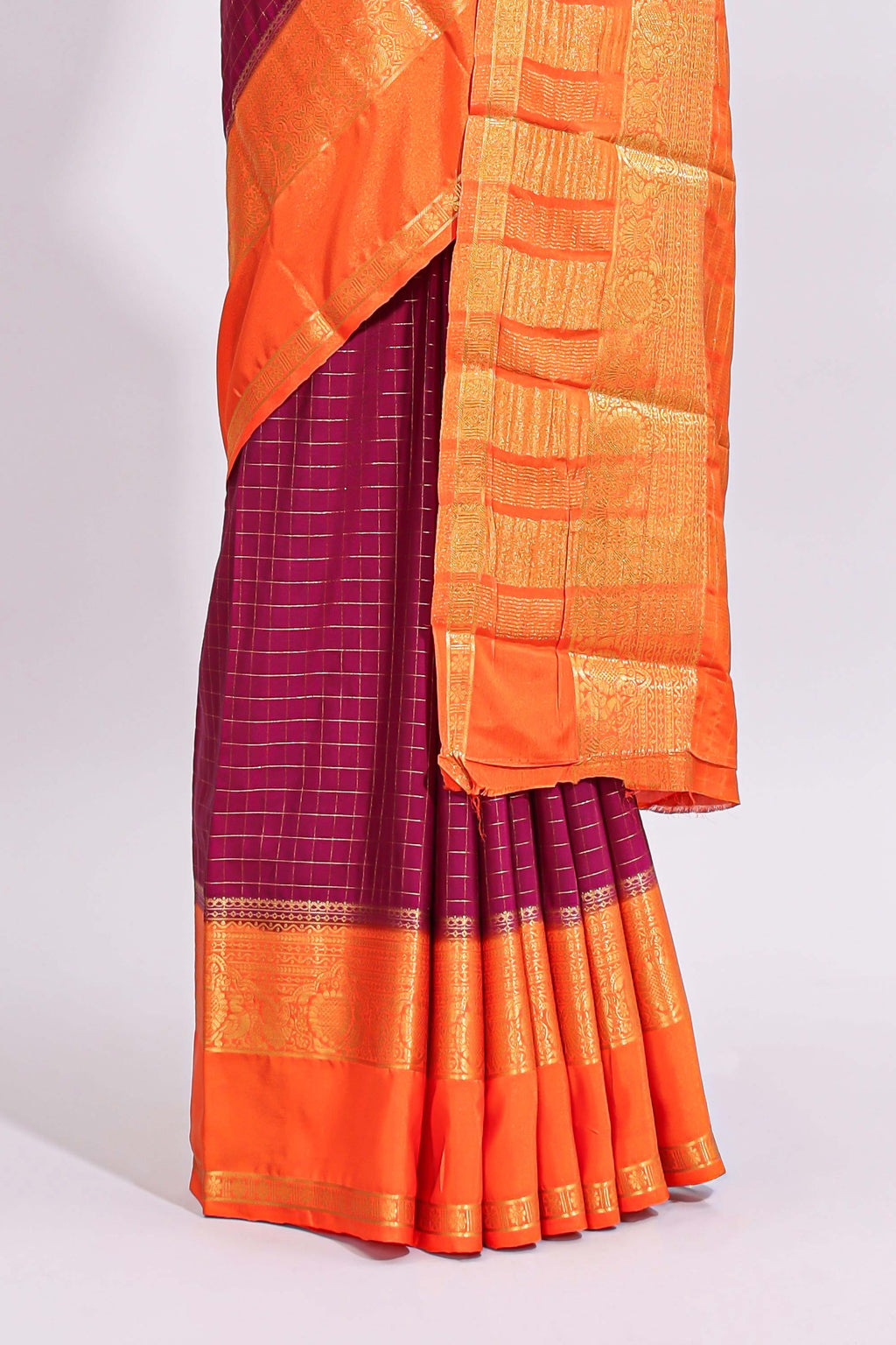 Magenta zari checked art mysore silk saree with contrast zari border and checked blouse