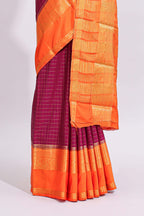 Magenta zari checked art mysore silk saree with contrast zari border and checked blouse