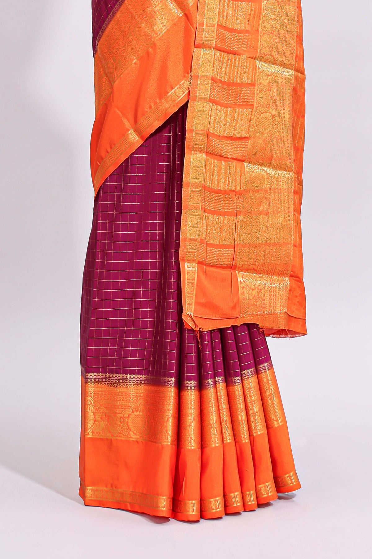 Magenta zari checked art mysore silk saree with contrast zari border and checked blouse