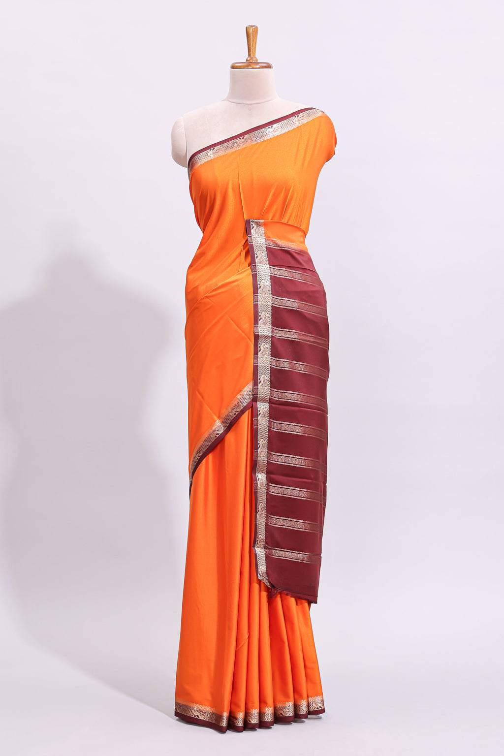 Orange plain art mysore silk saree with contrast zari border and blouse