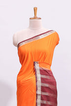 Orange plain art mysore silk saree with contrast zari border and blouse