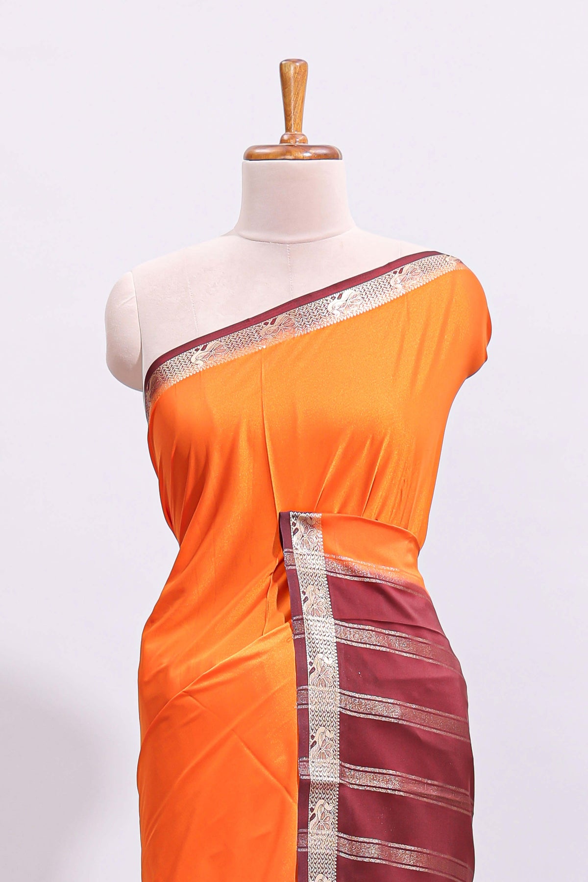 Orange plain art mysore silk saree with contrast zari border and blouse