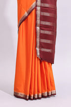 Orange plain art mysore silk saree with contrast zari border and blouse