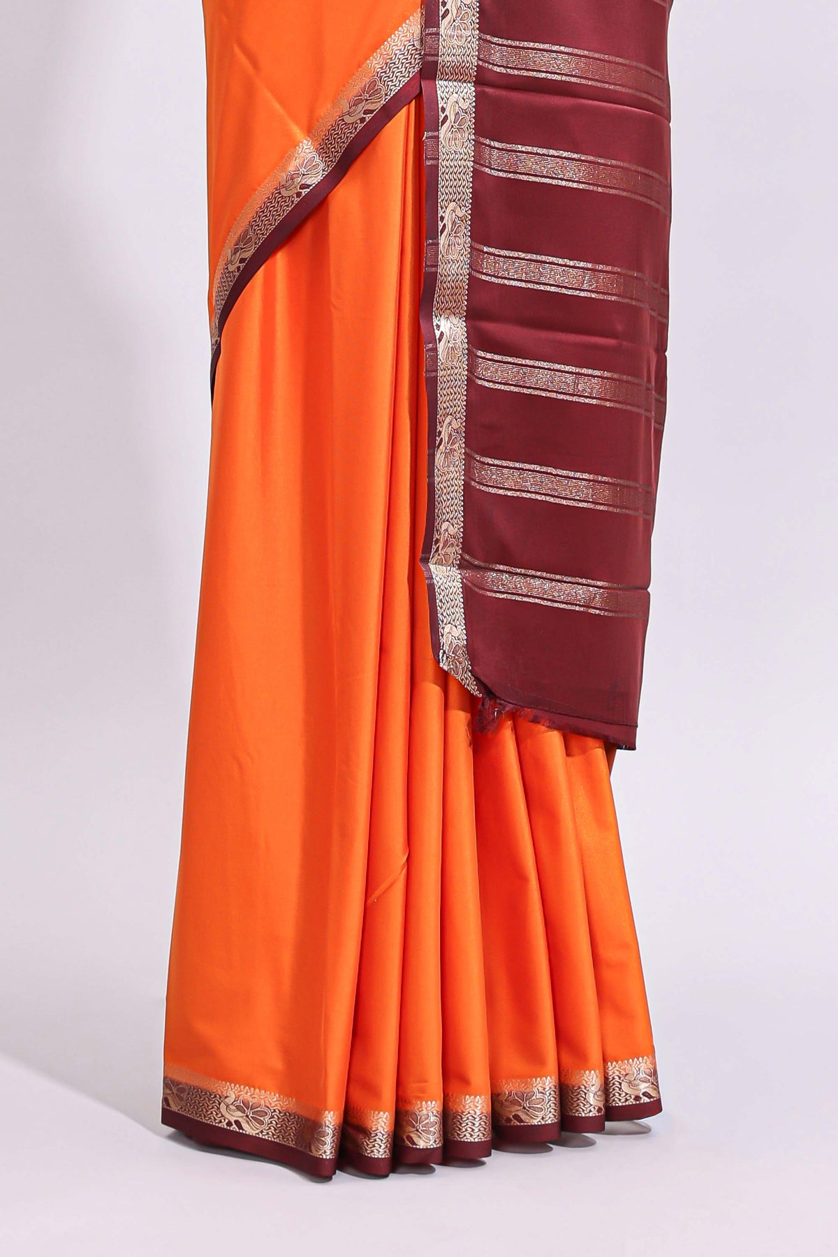 Orange plain art mysore silk saree with contrast zari border and blouse