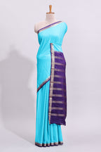 Turquoise blue plain art mysore silk saree with contrast zari border and blouse