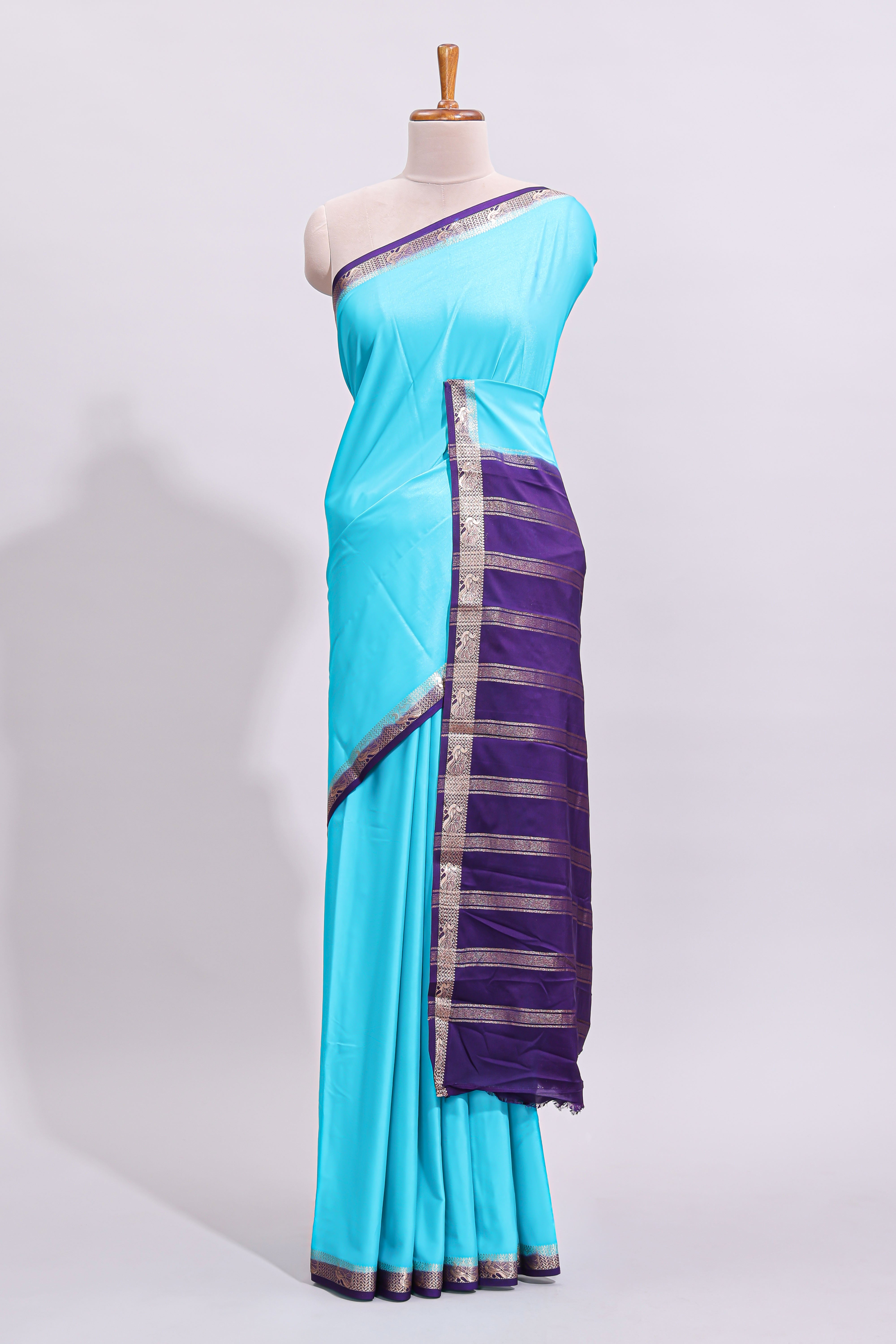 Turquoise blue plain art mysore silk saree with contrast zari border and blouse