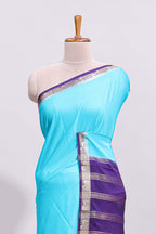 Turquoise blue plain art mysore silk saree with contrast zari border and blouse