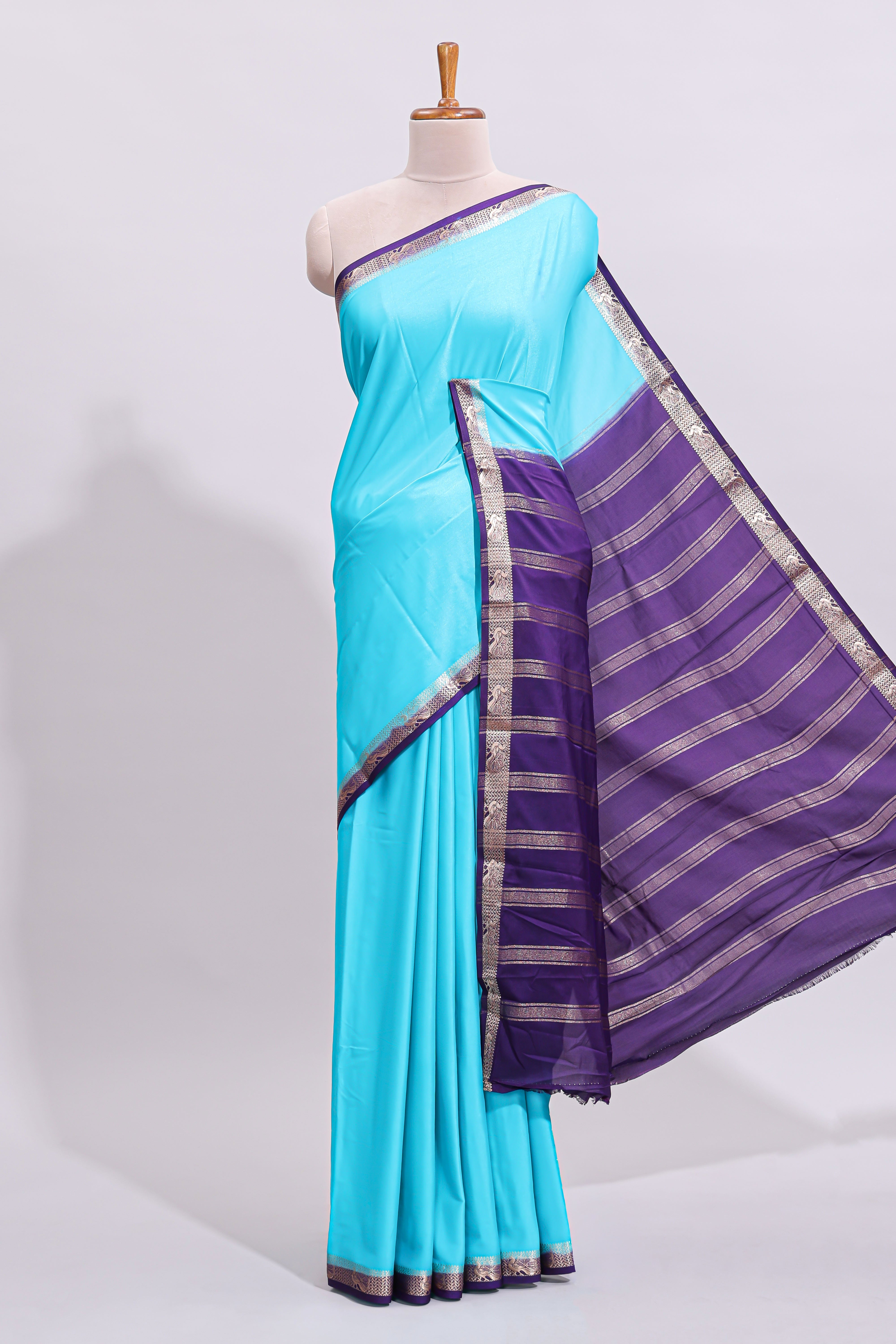 Turquoise blue plain art mysore silk saree with contrast zari border and blouse