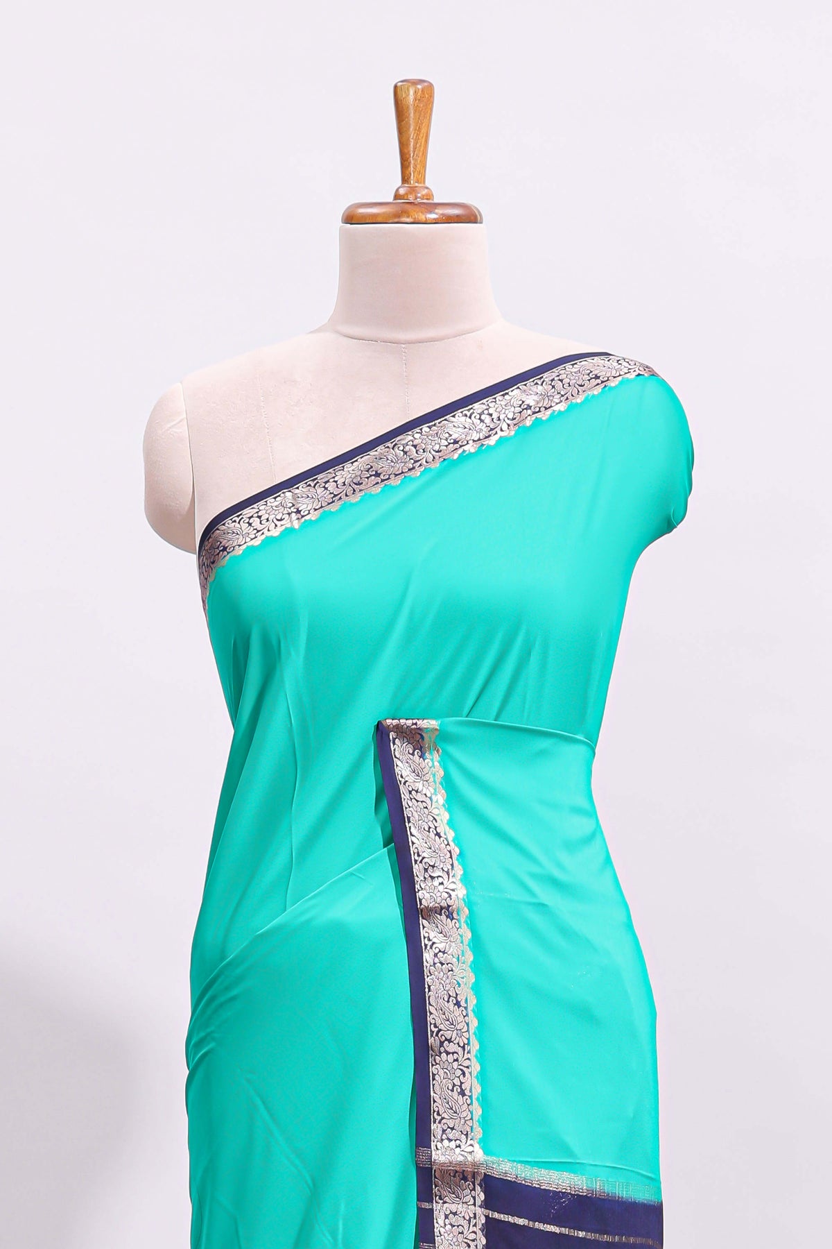 Green plain art mysore silk saree with contrast zari border and blouse