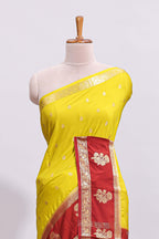 Yellow zari butta art mysore silk saree with contrast zari border and motifs blouse