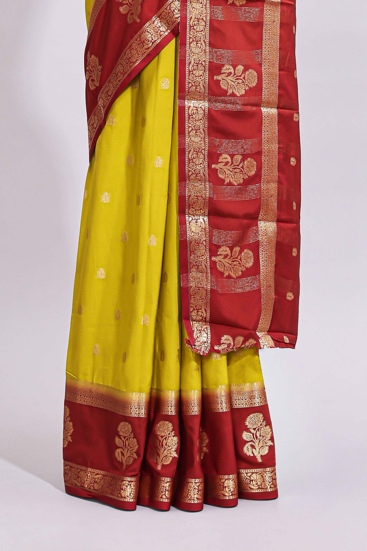 Yellow zari butta art mysore silk saree with contrast zari border and motifs blouse