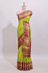 Green plain art mysore silk saree with contrast zari border and plain blouse