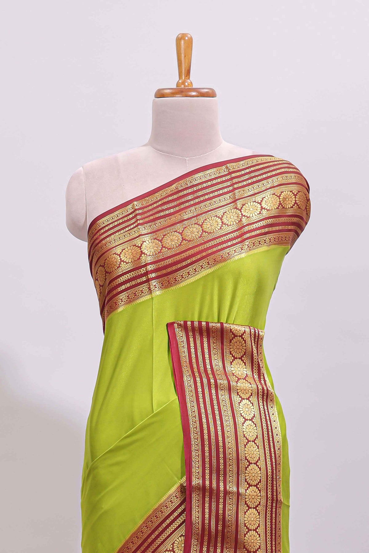 Green plain art mysore silk saree with contrast zari border and plain blouse