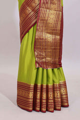 Green plain art mysore silk saree with contrast zari border and plain blouse