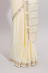 Off white plain art mysore silk saree with self zari border and matching blouse