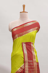 Green checked art mysore silk saree with contrast zari border and blouse
