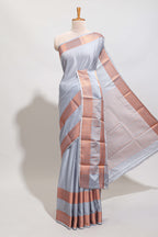 Sky blue plain art mysore silk saree with contrast zari border and matching blouse