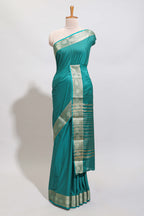 Green plain art mysore silk saree with self zari border and matching blouse