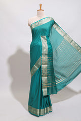 Green plain art mysore silk saree with self zari border and matching blouse