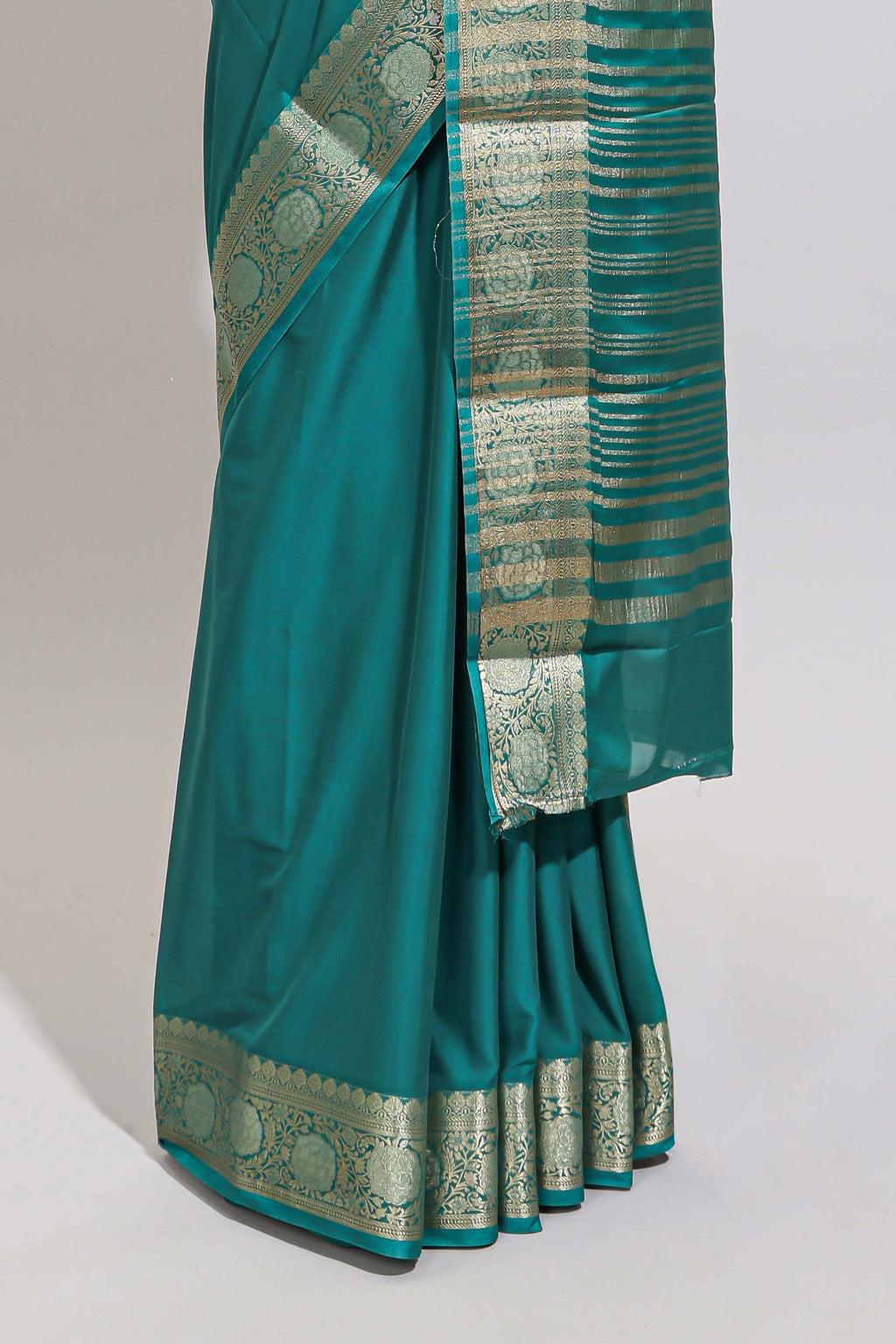 Green plain art mysore silk saree with self zari border and matching blouse