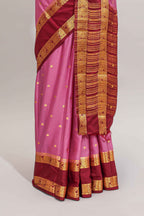 Pink butta designed art mysore silk saree with contrast zari border and blouse