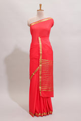Red plain art mysore silk saree with self zari border and matching blouse