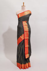 Black butta designed art mysore silk saree with contrast zari border and blouse