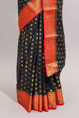 Black butta designed art mysore silk saree with contrast zari border and blouse