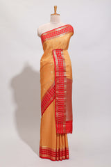Orange checked zari motifs art mysore silk saree with contrast zari border and checked blouse