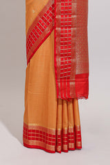 Orange checked zari motifs art mysore silk saree with contrast zari border and checked blouse