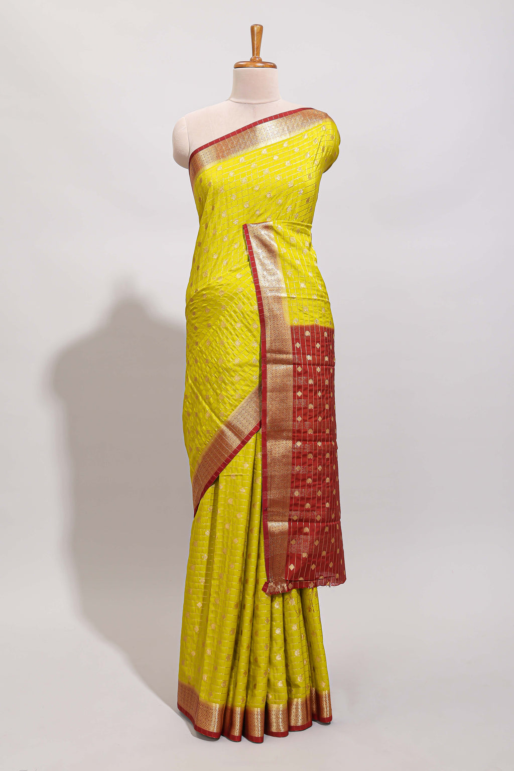 Lemon yellow checked zari motifs art mysore silk saree with contrast zari border and checked blouse