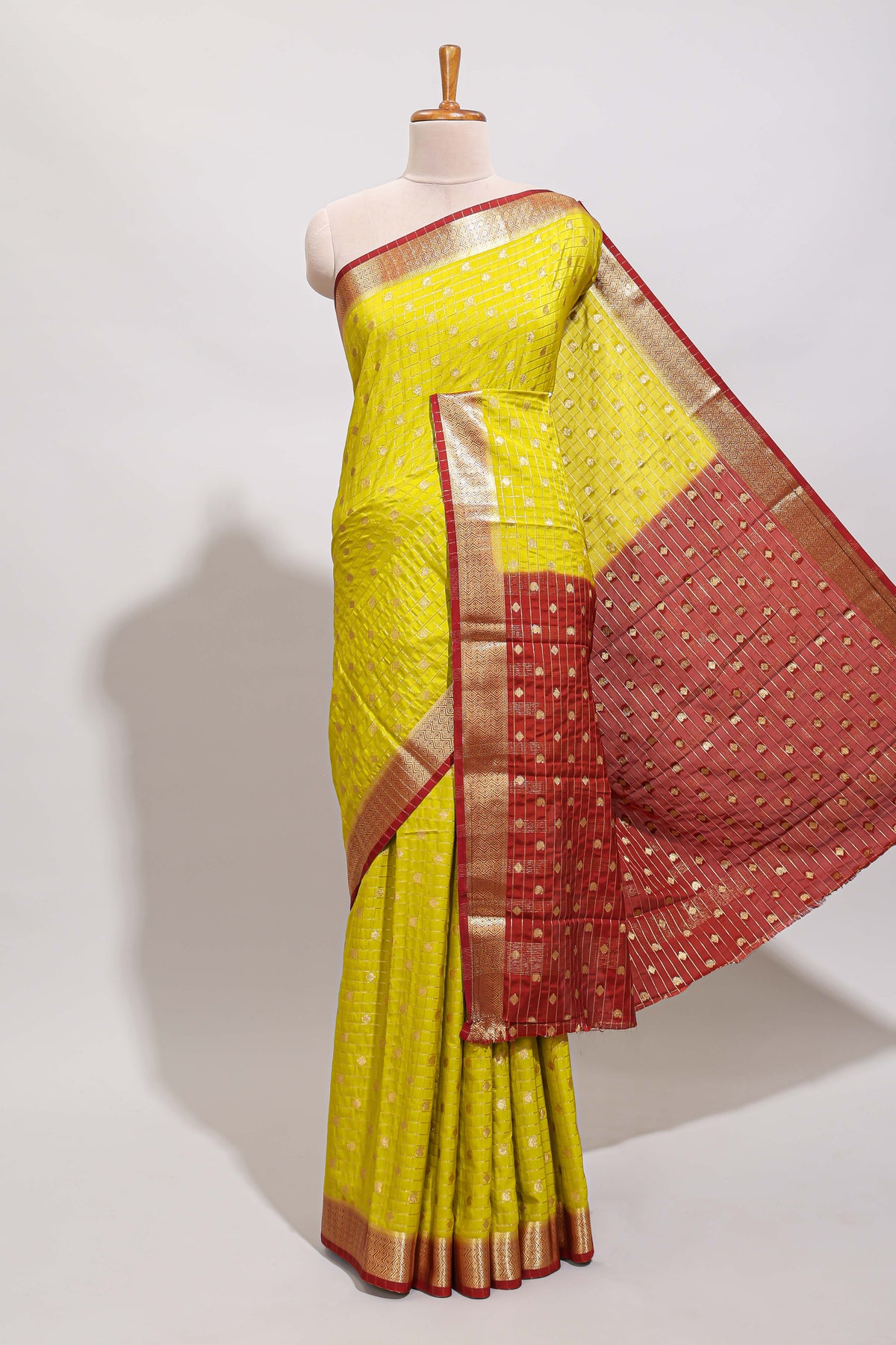 Lemon yellow checked zari motifs art mysore silk saree with contrast zari border and checked blouse