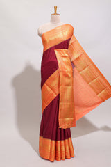 Maroon plain art mysore silk saree with contrast zari border and blouse