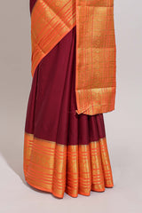 Maroon plain art mysore silk saree with contrast zari border and blouse