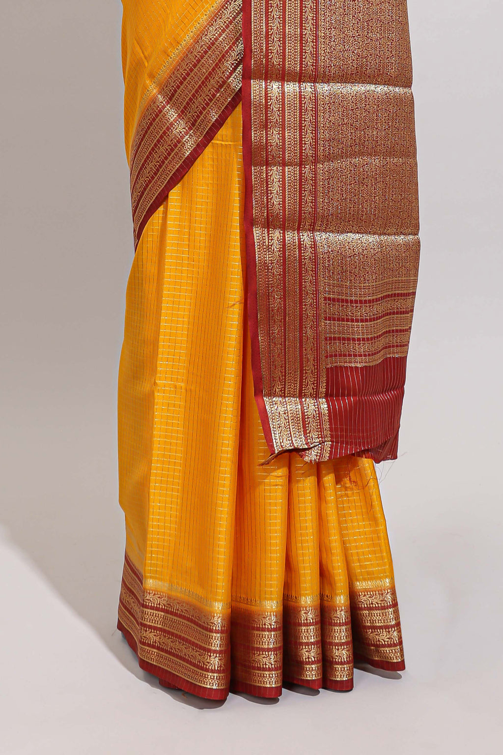 Yellow checked zari design art mysore silk saree with contrast border and blouse