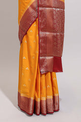 Orange zari motifs design art mysore silk saree with contrast zari border and blouse