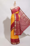 Orange checked zari design art mysore silk saree with contrast zari border and checked blouse