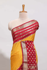 Orange checked zari design art mysore silk saree with contrast zari border and checked blouse