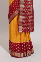 Orange checked zari design art mysore silk saree with contrast zari border and checked blouse
