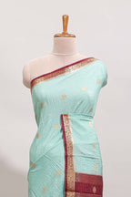Turquoise green checked zari motifs design art mysore silk saree with contrast zari border and checked blouse