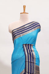 Blue checked design art mysore silk saree with contrast zari border and checked blouse