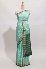 Green geometric zari motifs design art mysore silk saree with contrast zari border and blouse